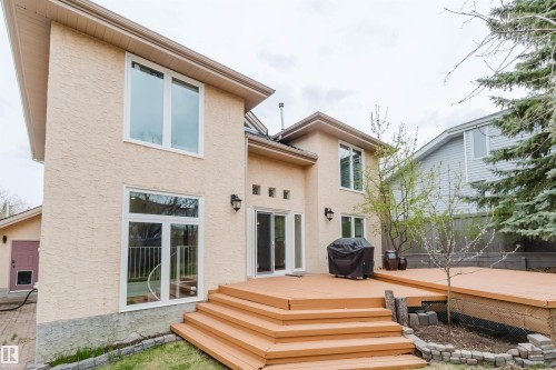 Expansive multi-level wood deck featuring broad stairs - 342 O'Connor Close, Edmonton, AB - Outdoor With Exterior