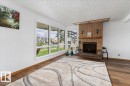 4916 51 Avenue, Ryley, AB  - Indoor Photo Showing Living Room With Fireplace 