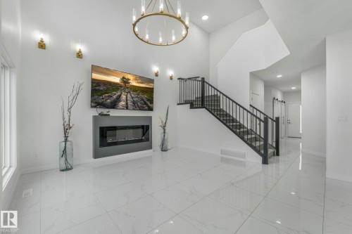 5741 Kootook Way, Edmonton, AB - Indoor Photo Showing Other Room With Fireplace