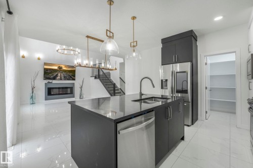 5741 Kootook Way, Edmonton, AB - Indoor Photo Showing Kitchen With Stainless Steel Kitchen With Double Sink With Upgraded Kitchen