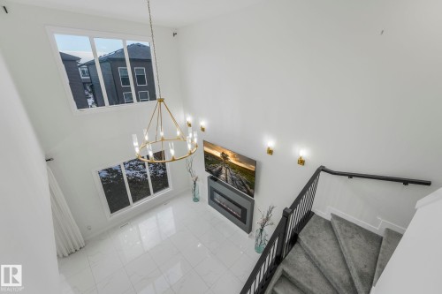 5741 Kootook Way, Edmonton, AB - Indoor Photo Showing Other Room With Fireplace