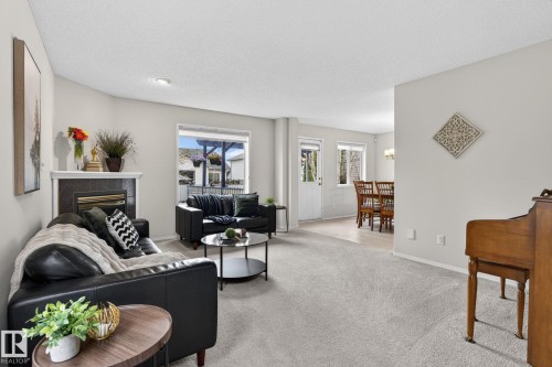 316 Wild Rose Way, Edmonton, AB - Indoor Photo Showing Living Room With Fireplace