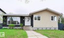 Curb appeal featuring a split-level facade with contrasting black and stucco finishes - 9523 151 Street, Edmonton, AB  - Outdoor 