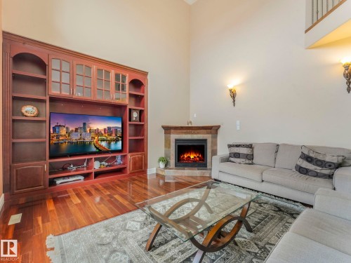 6911 17 Avenue, Edmonton, AB - Indoor Photo Showing Living Room With Fireplace