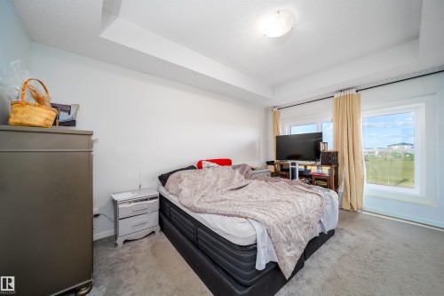Recessed ceiling detail over carpeted flooring - 9651 229 Street, Edmonton, AB - Indoor Photo Showing Bedroom