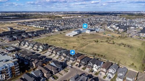 Aerial perspective showcasing a residential neighborhood with diverse housing styles - 9651 229 Street, Edmonton, AB - Outdoor With View