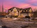 Stucco exterior with stone accents and a multi-level roofline - 1062 Tory Road, Edmonton, AB  - Outdoor 