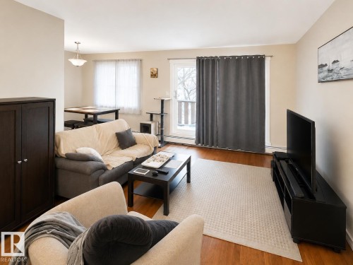 Photo has been digitally enhanced. - 10 11108 108 Avenue, Edmonton, AB - Indoor Photo Showing Living Room