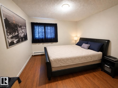 Photo has been digitally enhanced. - 10 11108 108 Avenue, Edmonton, AB - Indoor Photo Showing Bedroom