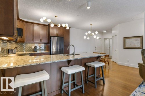 255 6079 Maynard Way, Edmonton, AB - Indoor Photo Showing Kitchen With Stainless Steel Kitchen With Upgraded Kitchen