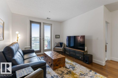 255 6079 Maynard Way, Edmonton, AB - Indoor Photo Showing Living Room