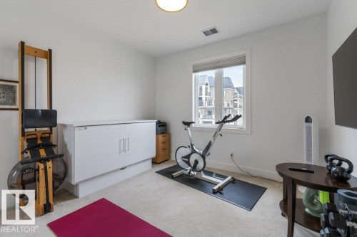 255 6079 Maynard Way, Edmonton, AB - Indoor Photo Showing Gym Room