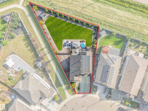 Backing onto serene greenspace with a walking trail along one side — just one neighbor and expansive natural surroundings to enjoy all four seasons. - 17703 9A Avenue, Edmonton, AB -  With View