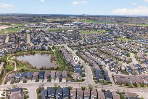 Aerial perspective showcasing a residential neighborhood with varied housing styles - 2146 Austin Link Link, Edmonton, AB - Outdoor With View