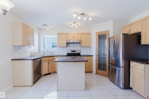 7713 Schmid Crescent, Edmonton, AB - Indoor Photo Showing Kitchen With Stainless Steel Kitchen With Double Sink