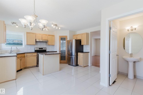 7713 Schmid Crescent, Edmonton, AB - Indoor Photo Showing Kitchen With Stainless Steel Kitchen