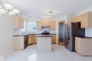 7713 Schmid Crescent, Edmonton, AB  - Indoor Photo Showing Kitchen With Stainless Steel Kitchen 