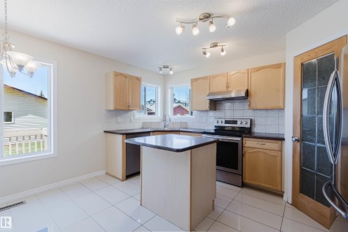 7713 Schmid Crescent, Edmonton, AB - Indoor Photo Showing Kitchen With Stainless Steel Kitchen