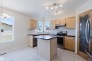7713 Schmid Crescent, Edmonton, AB  - Indoor Photo Showing Kitchen With Stainless Steel Kitchen 