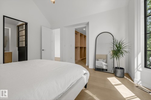 Vaulted white ceilings featuring light wood-finish flooring - 13804 85 Avenue, Edmonton, AB - Indoor Photo Showing Bedroom
