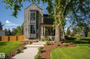 Stone exterior featuring a prominent bay window with dark trim - 13804 85 Avenue, Edmonton, AB  - Outdoor 