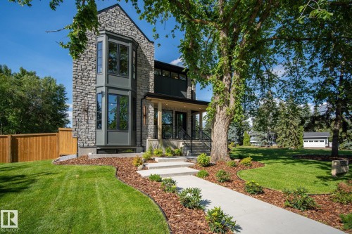 Stone facade residence featuring a prominent bay window - 13804 85 Avenue, Edmonton, AB - Outdoor