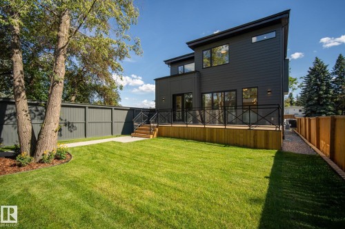 Modern residence featuring dark gray siding and a flat roofline - 13804 85 Avenue, Edmonton, AB - Outdoor