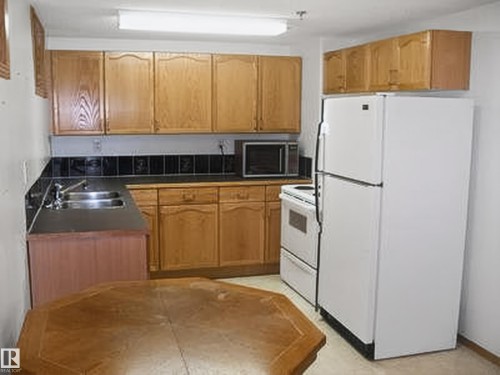 13007 / 13009 111 Avenue, Edmonton, AB - Indoor Photo Showing Kitchen