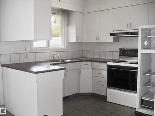 13007 / 13009 111 Avenue, Edmonton, AB - Indoor Photo Showing Kitchen