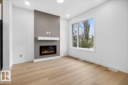 10637 68 Avenue, Edmonton, AB - Indoor Photo Showing Living Room With Fireplace