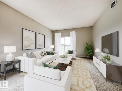 14 3040 Spence Wynd, Edmonton, AB - Indoor Photo Showing Living Room