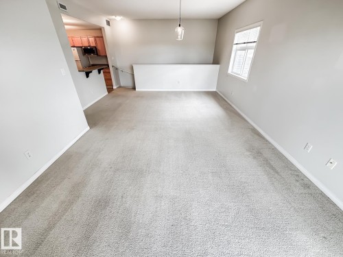 14 3040 Spence Wynd, Edmonton, AB - Indoor Photo Showing Other Room