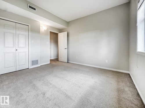 14 3040 Spence Wynd, Edmonton, AB - Indoor Photo Showing Other Room