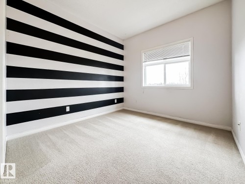 14 3040 Spence Wynd, Edmonton, AB - Indoor Photo Showing Other Room