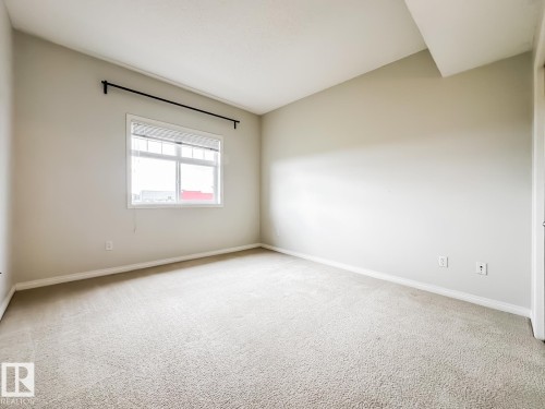 14 3040 Spence Wynd, Edmonton, AB - Indoor Photo Showing Other Room