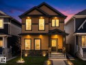 Two-story residence featuring horizontal siding and stone accents - 1231 Watt Drive, Edmonton, AB  - Outdoor 