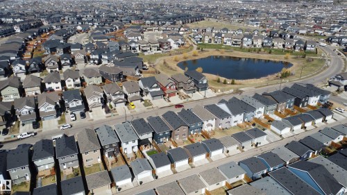 Expansive residential development featuring a central pond - 1231 Watt Drive, Edmonton, AB - Outdoor With View