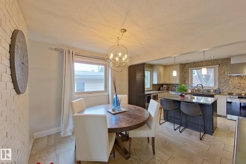 Open-concept kitchen and dining area featuring tile flooring - 10 Brunswick Crescent, St. Albert, AB - Indoor Photo Showing Dining Room