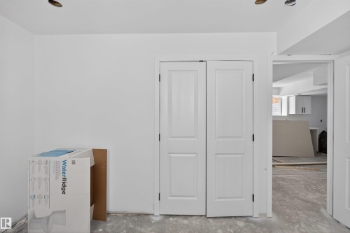 Freshly painted white walls with recessed ceiling light fixtures - 151 Kidd Crescent, Leduc, AB - Indoor