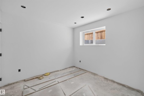 Room featuring a white-framed window, recessed ceiling lighting, and light gray walls - 151 Kidd Crescent, Leduc, AB - Indoor Photo Showing Other Room