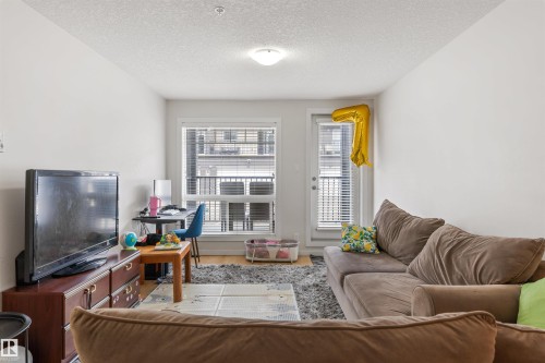110 9517 160 Avenue, Edmonton, AB - Indoor Photo Showing Living Room