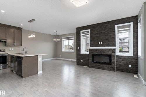 8729 Carson Way, Edmonton, AB - Indoor Photo Showing Other Room With Fireplace