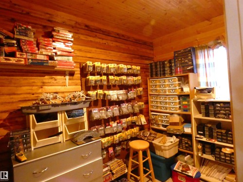 Used currently as a hobby space, this room has differing options depending on what YOU may be needing. - 307 Willow Place, Rural Barrhead County, AB 