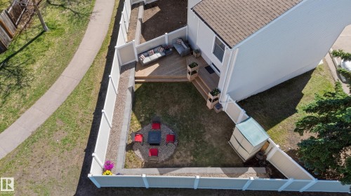 The backyard from above featuring a wood deck, fire pit area, and a storage shed - 14522 56 Street, Edmonton, AB - Outdoor