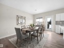 Open-concept dining area featuring light wood-finish flooring - 8921 217 Street Nw, Edmonton, AB  - Indoor Photo Showing Dining Room 