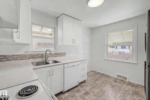 9276 86 Street, Edmonton, AB - Indoor Photo Showing Kitchen With Double Sink