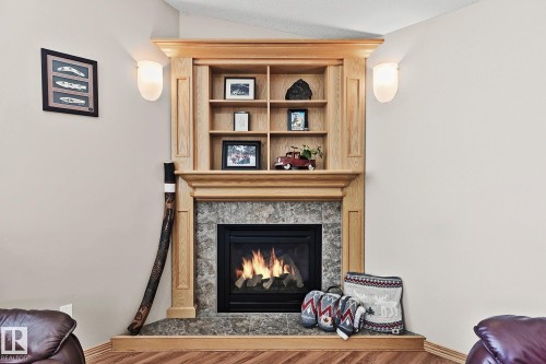 98 Hewitt Circle, Spruce Grove, AB - Indoor Photo Showing Living Room With Fireplace