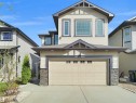 Contemporary two-story residence featuring light-toned siding and dark trim accents - 2017 32A Street, Edmonton, AB  - Outdoor 