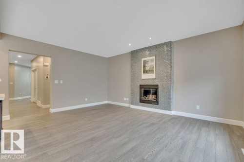 1958 Ainslie Link, Edmonton, AB - Indoor Photo Showing Living Room With Fireplace