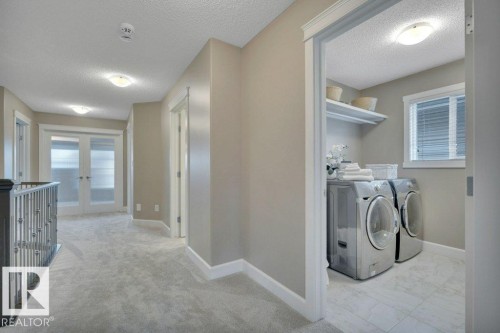 1958 Ainslie Link, Edmonton, AB - Indoor Photo Showing Laundry Room